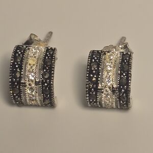 sterling silver J-hoop earrings featuring marcasite and pavé stones. 